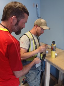 Clyde in his castle soldering our SIC cable (it allows us to  charge all of our USB devices from our wheel hub)