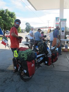 Stopping to fill our camping stove with fuel, we pulled Falkor#2 up to the bowser behind the motor bikes. We created quite a rucas!