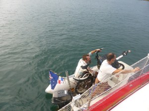 Loading Falkor onto the Roller Coaster from the dinghy