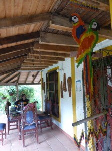 Iko playing guitar at the Casa