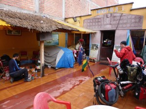 Undercover camping at a restaurant in Copacabana Bolivia. Thanks Andre for sheltering us from the storm